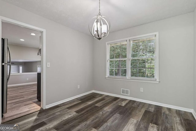 2849 Snapfinger Rd, Decatur, GA 30034 - spare room with a chandelier, dark wood finished floors, and recessed lighting