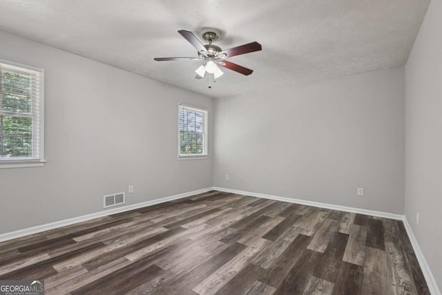 2849 Snapfinger Rd, Decatur, GA 30034 - spare room featuring dark wood-style floors and a ceiling fan