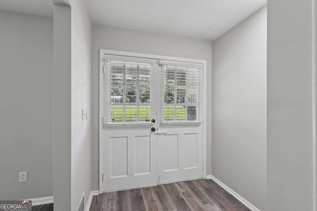2849 Snapfinger Rd, Decatur, GA 30034 - doorway featuring dark wood-style flooring and baseboards