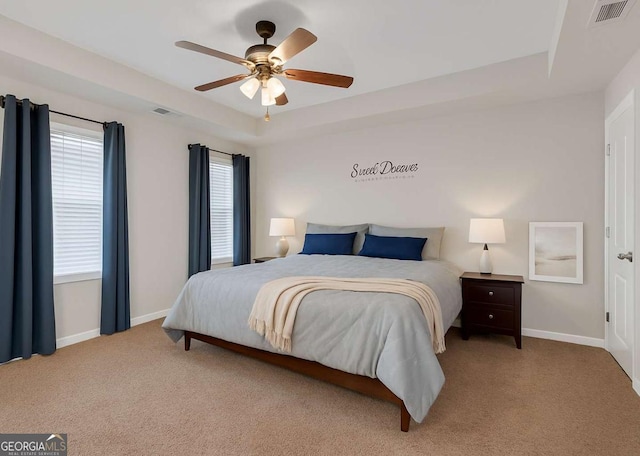 5807 Mitchell Chase Trl, Mableton, GA 30126 - bedroom with carpet, multiple windows, a raised ceiling, and a ceiling fan