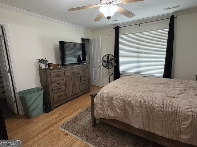44 Hawk Spring Dr SW, Rome, GA 30165 - bedroom with ornamental molding, light wood-style flooring, and ceiling fan