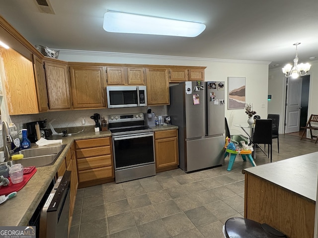 44 Hawk Spring Dr SW, Rome, GA 30165 - kitchen featuring stainless steel appliances, crown molding, a chandelier, brown cabinetry, and tasteful backsplash