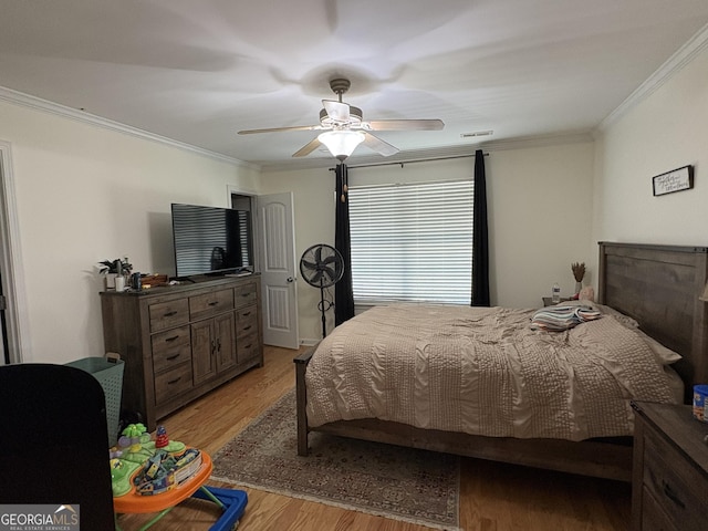 44 Hawk Spring Dr SW, Rome, GA 30165 - bedroom with ornamental molding, light wood finished floors, and a ceiling fan