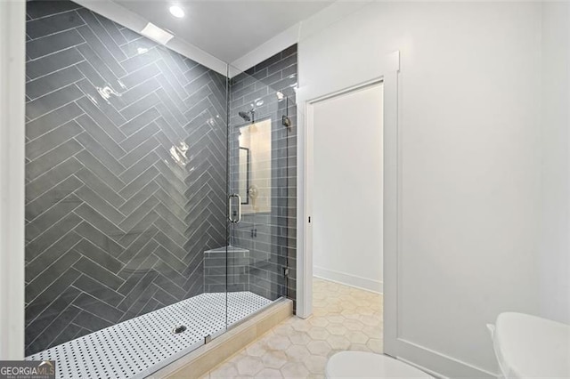 103 Maddox Rd, Buford, GA 30518 - bathroom with a shower stall, tile patterned floors, and recessed lighting