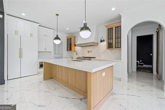 103 Maddox Rd, Buford, GA 30518 - kitchen with decorative backsplash, light countertops, light marble finish flooring, and recessed lighting