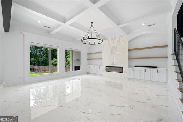 103 Maddox Rd, Buford, GA 30518 - unfurnished living room with stairs, a chandelier, a fireplace, coffered ceiling, and beamed ceiling