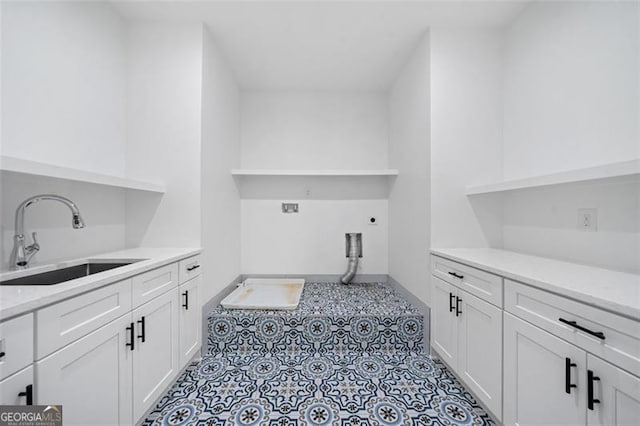 103 Maddox Rd, Buford, GA 30518 - laundry area with cabinet space, electric dryer hookup, light tile patterned floors, and hookup for a washing machine