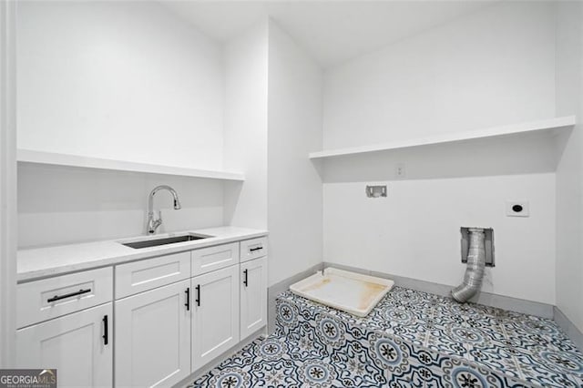 103 Maddox Rd, Buford, GA 30518 - laundry area featuring electric dryer hookup and cabinet space