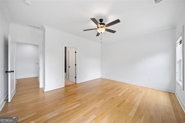 103 Maddox Rd, Buford, GA 30518 - unfurnished room with ceiling fan, light wood-style floors, crown molding, and a smoke detector