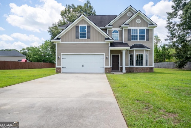 43 NE Yearling Ct, Ludowici, GA 31316 - craftsman-style home featuring concrete driveway, a garage, board and batten siding, and brick siding