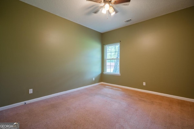 43 NE Yearling Ct, Ludowici, GA 31316 - carpeted spare room featuring ceiling fan and a textured ceiling