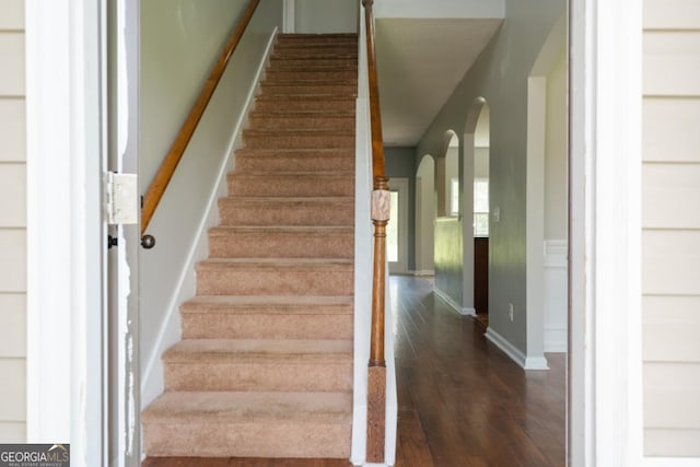 43 NE Yearling Ct, Ludowici, GA 31316 - staircase with wood finished floors and baseboards