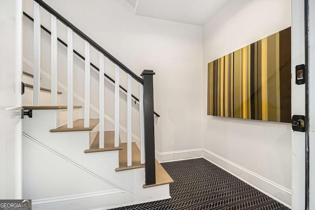 1833 N Rock Springs Rd NE, Atlanta, GA 30324 - stairs featuring baseboards