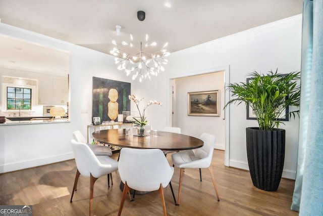 1833 N Rock Springs Rd NE, Atlanta, GA 30324 - dining space featuring wood finished floors and a chandelier