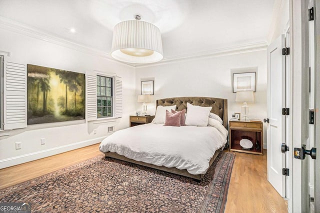 1833 N Rock Springs Rd NE, Atlanta, GA 30324 - bedroom with wood finished floors and crown molding