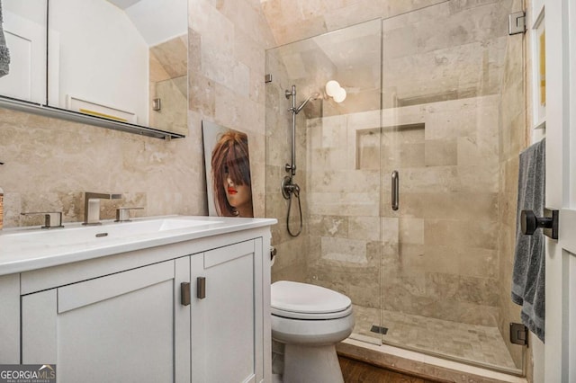 1833 N Rock Springs Rd NE, Atlanta, GA 30324 - bathroom with vanity, a stall shower, and backsplash
