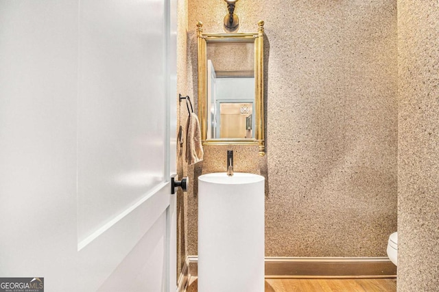 1833 N Rock Springs Rd NE, Atlanta, GA 30324 - half bath featuring toilet and wood finished floors