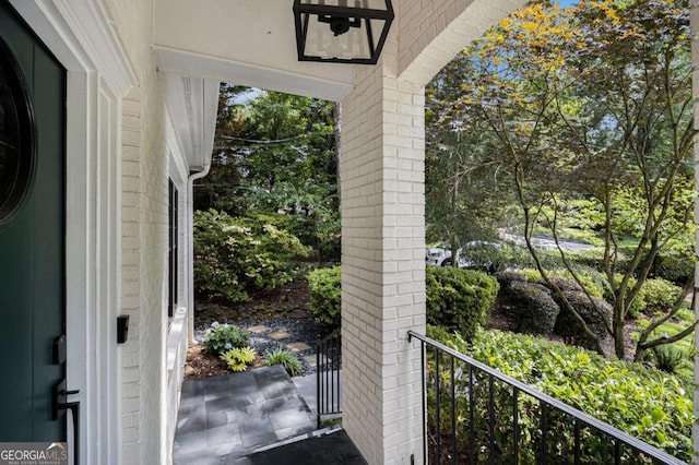 1833 N Rock Springs Rd NE, Atlanta, GA 30324 - covered porch featuring view of wooded area