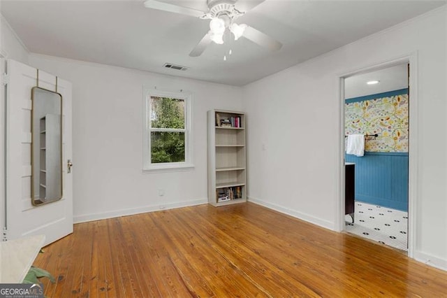 3158 Granby Ave, Scottdale, GA 30079 - unfurnished room featuring hardwood / wood-style floors, a ceiling fan, and ornamental molding