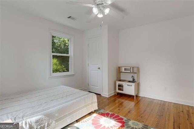 3158 Granby Ave, Scottdale, GA 30079 - bedroom with wood finished floors and ceiling fan