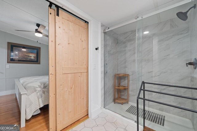 103 Fawn Ct, Eatonton, GA 31024 - ensuite bathroom with a marble finish shower, ceiling fan, and wood finished floors