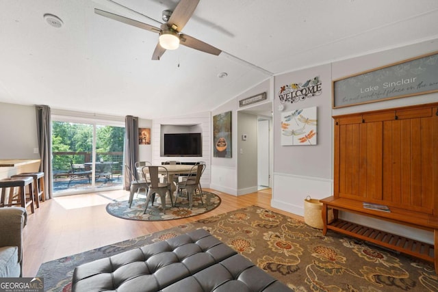 103 Fawn Ct, Eatonton, GA 31024 - living area with light wood finished floors, ceiling fan, and vaulted ceiling