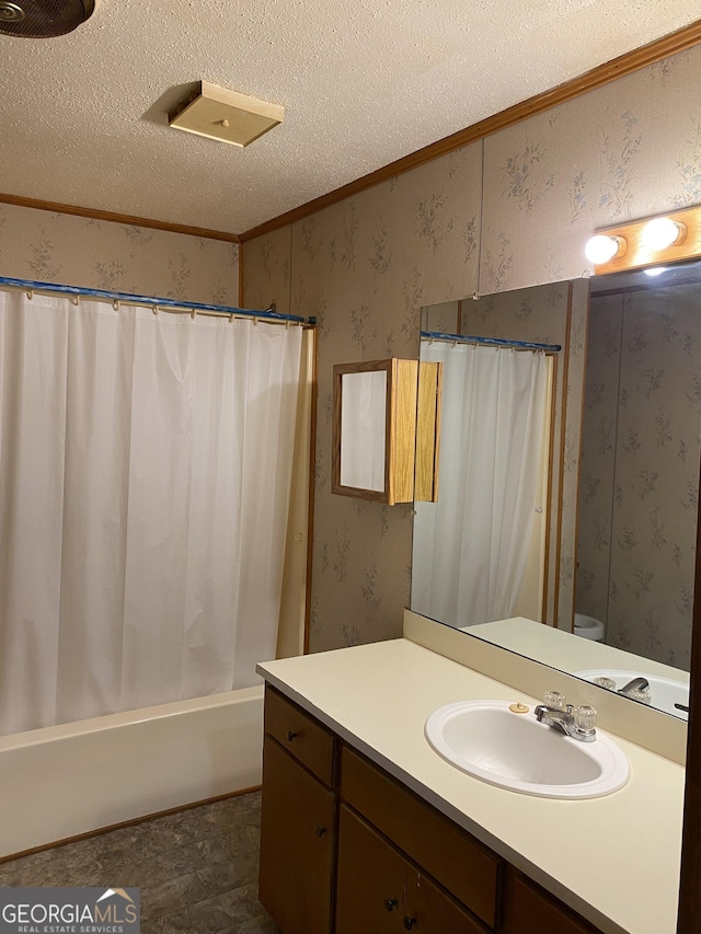 6617 18th St SW, Lanett, AL 36863 - full bathroom with a textured ceiling, crown molding, vanity, wallpapered walls, and shower / bath combo with shower curtain