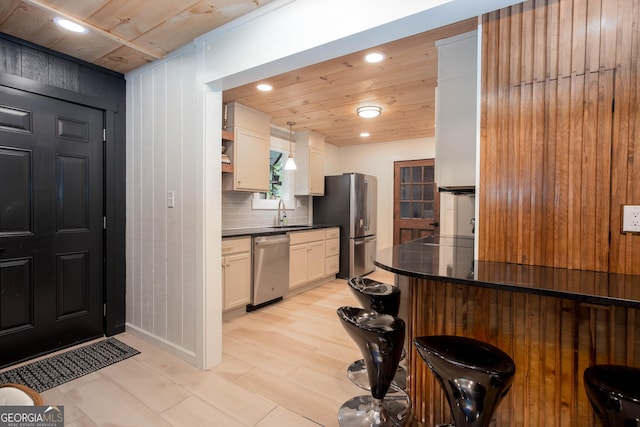 101 Pawnee St, Waleska, GA 30183 - kitchen with appliances with stainless steel finishes, dark countertops, white cabinetry, tasteful backsplash, and recessed lighting