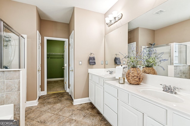 3725 Downing Dr, Cumming, GA 30040 - full bath featuring a stall shower, double vanity, and a spacious closet
