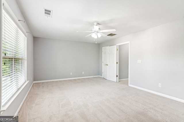 3725 Downing Dr, Cumming, GA 30040 - empty room featuring light carpet and ceiling fan