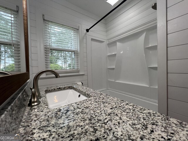 319 N Line St, Dexter, GA 31019 - full bathroom with shower / washtub combination and vanity