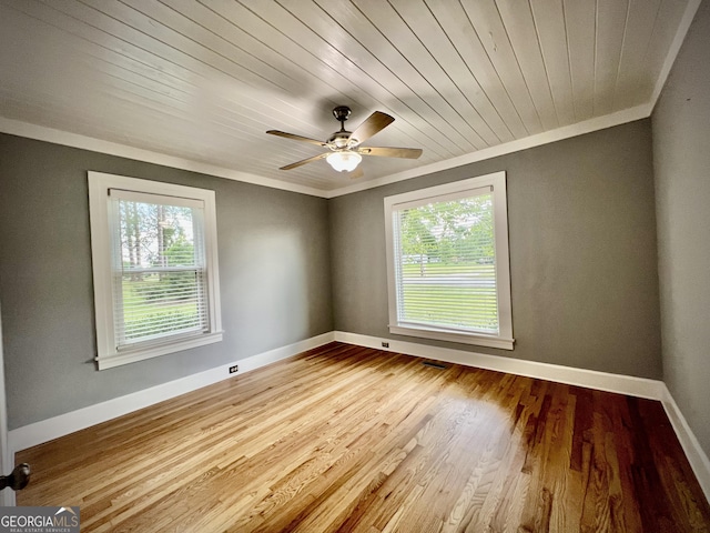 319 N Line St, Dexter, GA 31019 - spare room featuring plenty of natural light, ornamental molding, ceiling fan, wood finished floors, and wood ceiling
