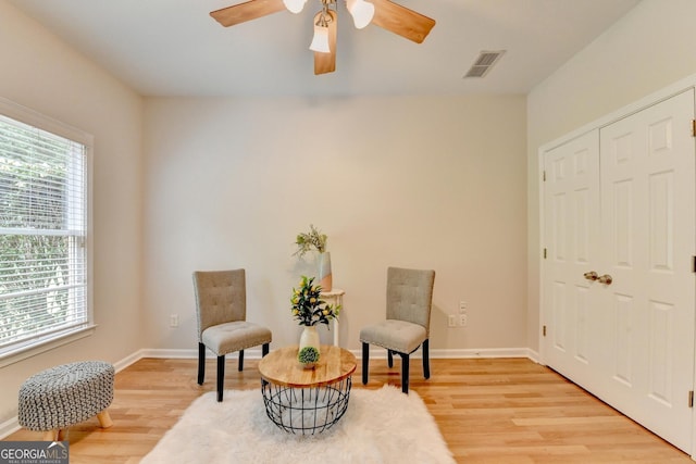 1868 Birch Briar Bnd, Lawrenceville, GA 30043 - living area featuring light wood finished floors and ceiling fan