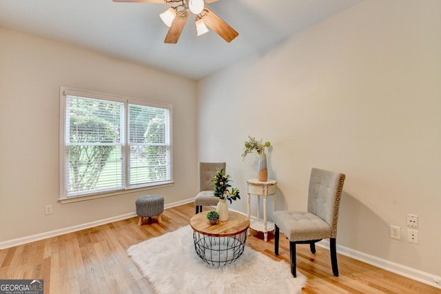 1868 Birch Briar Bnd, Lawrenceville, GA 30043 - living area featuring ceiling fan and wood finished floors