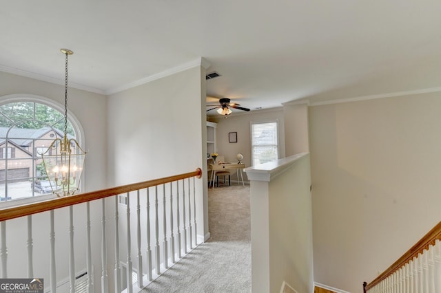 1868 Birch Briar Bnd, Lawrenceville, GA 30043 - hallway featuring carpet, healthy amount of natural light, ornamental molding, a chandelier, and an upstairs landing