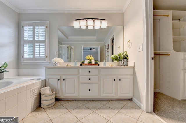1868 Birch Briar Bnd, Lawrenceville, GA 30043 - full bathroom with double vanity, a stall shower, a garden tub, crown molding, and tile patterned floors
