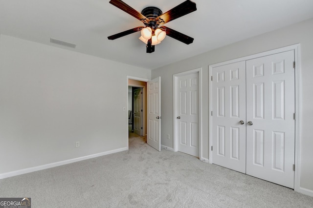 1868 Birch Briar Bnd, Lawrenceville, GA 30043 - unfurnished bedroom featuring carpet flooring, two closets, and ceiling fan