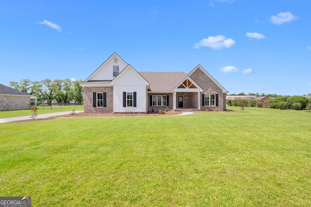 3 Honeysuckle Dr, Claxton, GA 30417 - view of front of property featuring brick siding and a front yard
