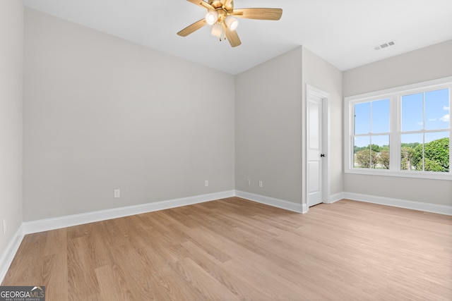 3 Honeysuckle Dr, Claxton, GA 30417 - unfurnished room featuring light wood finished floors and a ceiling fan