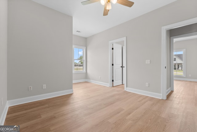3 Honeysuckle Dr, Claxton, GA 30417 - unfurnished bedroom featuring light wood-type flooring and ceiling fan