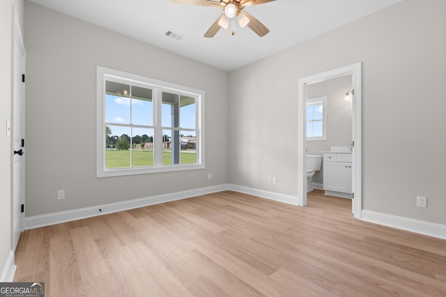 3 Honeysuckle Dr, Claxton, GA 30417 - unfurnished bedroom featuring light wood finished floors and ensuite bathroom