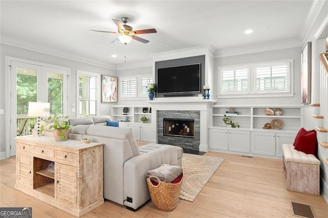 127 Oak Ln, Decatur, GA 30030 - living area featuring light wood-style flooring, ceiling fan, a fireplace with flush hearth, crown molding, and recessed lighting