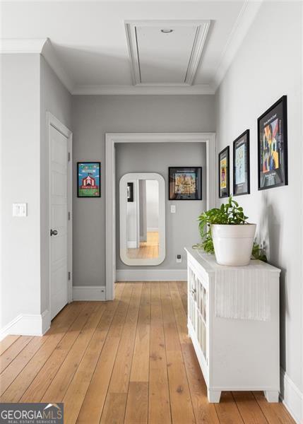 127 Oak Ln, Decatur, GA 30030 - hallway featuring light wood-type flooring, attic access, and crown molding