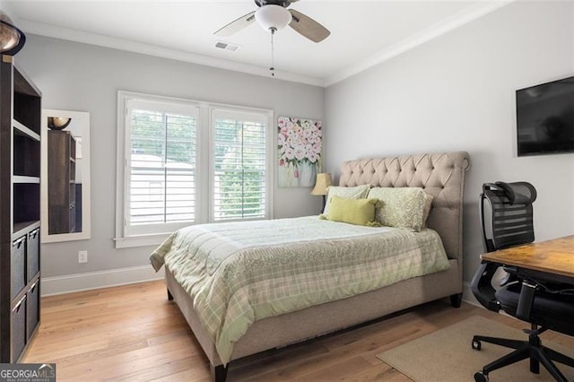 127 Oak Ln, Decatur, GA 30030 - bedroom with light wood-style flooring, crown molding, a desk, and a ceiling fan