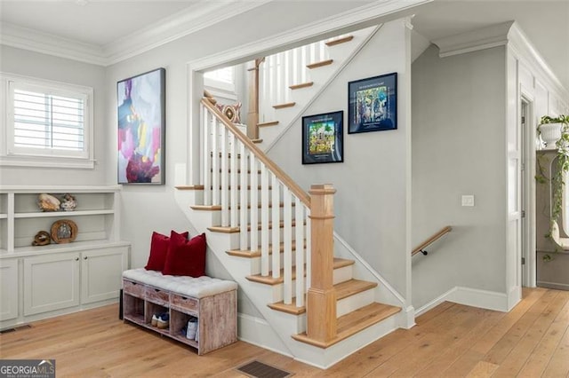 127 Oak Ln, Decatur, GA 30030 - stairs with hardwood / wood-style flooring and crown molding