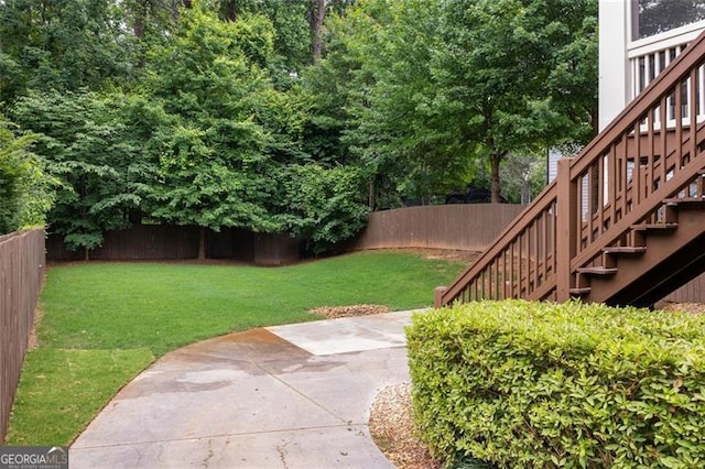 127 Oak Ln, Decatur, GA 30030 - fenced backyard with stairway and a patio