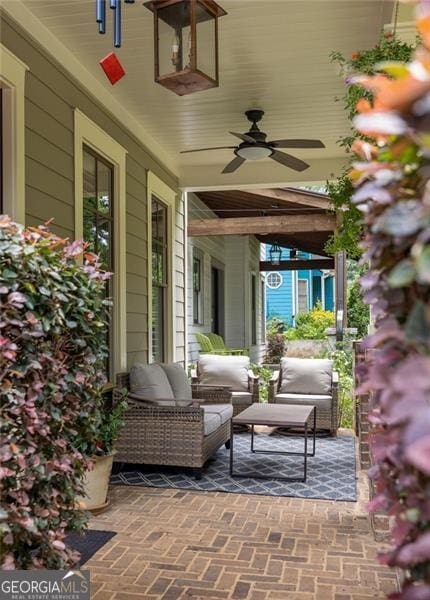 127 Oak Ln, Decatur, GA 30030 - porch with a ceiling fan and an outdoor living space