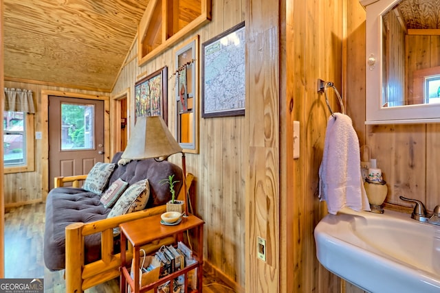 77 Falls View Dr, Dillard, GA 30537 - living room featuring wood walls, lofted ceiling, wood finished floors, and wooden ceiling