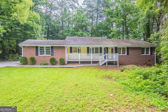 4201 Hicks Rd, Austell, GA 30106 - ranch-style house featuring a porch, brick siding, a front yard, and crawl space
