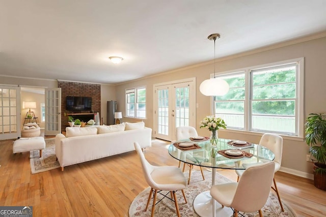 4201 Hicks Rd, Austell, GA 30106 - dining area featuring french doors, light wood finished floors, and ornamental molding